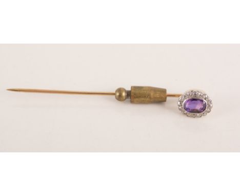 Amethyst and diamond stick pin, yellow metal mount.