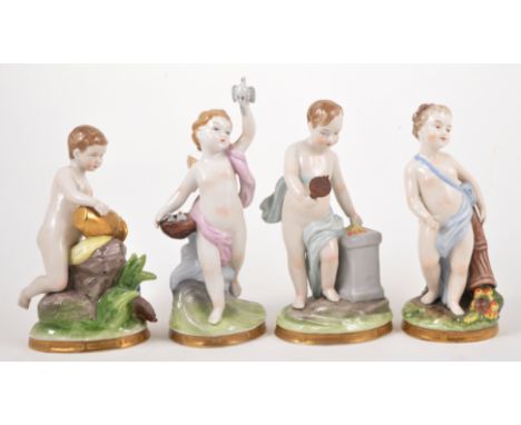 A set of four Capodimonte models of cherubs, 19cm; and a Spode Copeland china plain white dessert basket, modelled with cheru