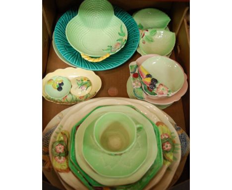 A box of miscellaneous china to include; Carltonware cups and saucers, Carltonware leaf dishes, Clarice Cliff plate etc
