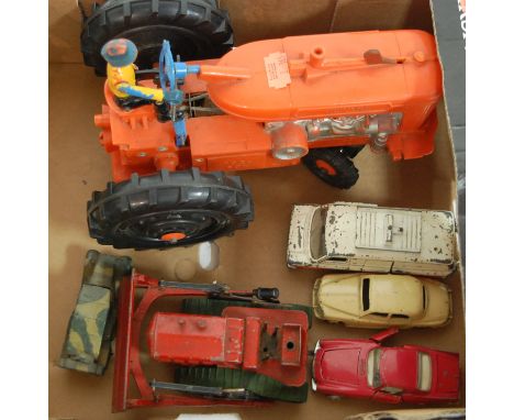 A battery operated reversible diesel electric tractor together with various loose playworn diecast toy vehicles to include Di