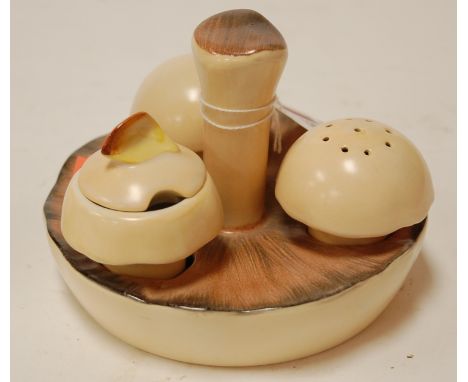 A mid 20th century Carltonware three piece mushroom cruet