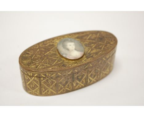 A continental engraved and gilded brass table snuff box