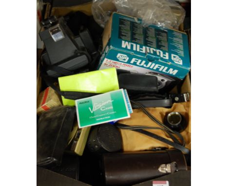 A box of assorted cameras and accessories to include Fuji digital camera MX1700 zoom, Polaroid etc 