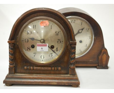 A 1920s oak cased mantel clock having a silvered dial and Arabic numerals together with a 1930s oak cased example (2)