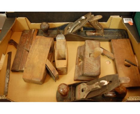 A box of assorted hand tools to include various moulding planes etc