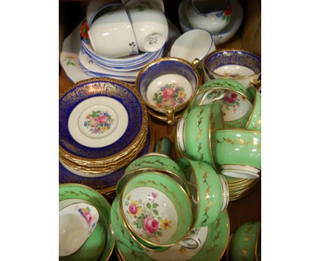 A Victorian part tea service, having hand-painted floral decoration on a green ground, with gilt decoration; together with va