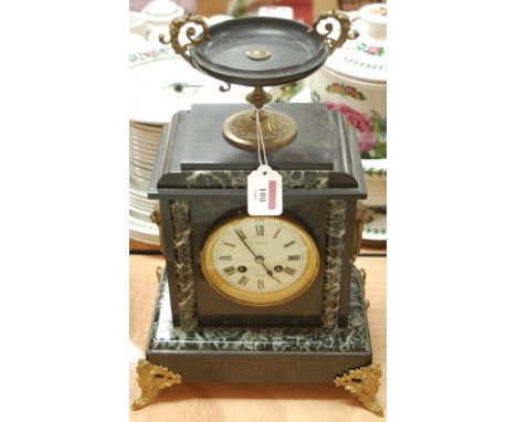 A late 19th century marble and gilt metal mounted cased mantel clock having enamel dial with Roman numerals and eight day mov