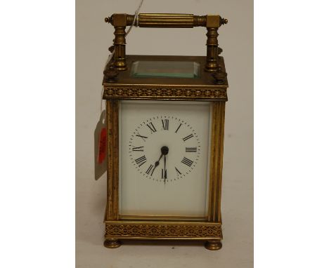 An early 20th century brass cased carriage clock having visible platform lever escapement