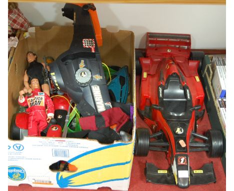 A small collection of various Action Man figures together with a model formula 1 car