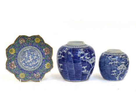 ~ A 19th century Chinese blue and white vase, painted with a typical river landscape, two similar sleeve vases, three ginger 