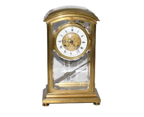 A brass striking mantle clock circa 1900, the case with bevelled glass panels, Roman numeral enamel chapter ring signed Sorle