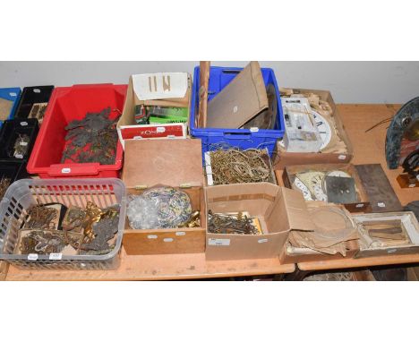 A mixed selection of clock items including winding keys, metal case mounts, gilt metal bells, longcase clock gut, selection o