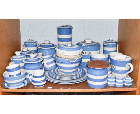 ~ A quantity of Cornish ware pottery including kitchen storage jars (one shelf)Condition report: Jars - Sugar, Coffee, Biscui