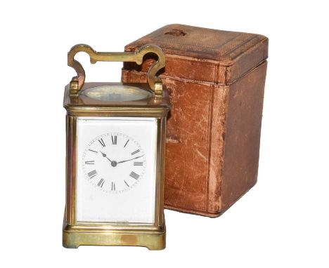 A brass striking carriage clock, circa 1900, twin spring barrel movement, the platform lever escapement striking on a gon, wi