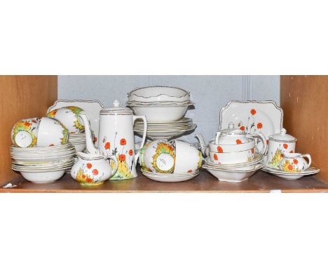 ~A Crown Ducal Art Deco part tea service in the Poppies design, including teapot, coffee pot, cake stand and salad drainer et