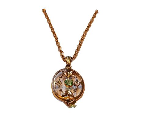 A peridot pendant on chain, pendant length 4.3cm, chain length 51.5cmCondition report: Chain clasp stamped but marks rubbed. 
