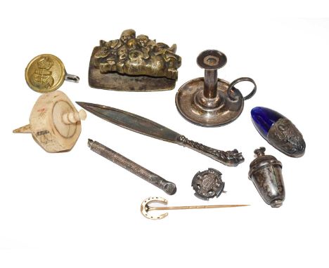 Assorted silver collectables, including: a paperclip, a miniature taper stick, an acorn formed tape measure etc, together wit