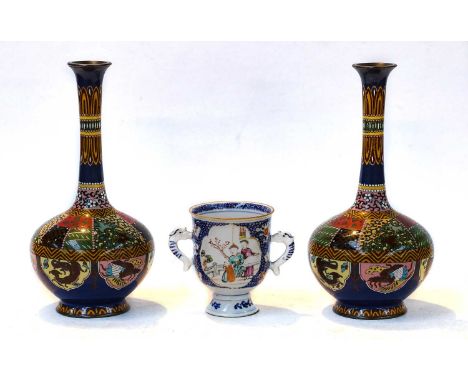 A pair of Japanese Meiji period cloisonne bottle vases, together with an 18th century Chinese loving cup enameled with panels