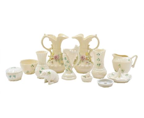 A quantity of modern Belleek China, including a pair of ewers, a model of a harp, and two model pigs, etc (one tray)