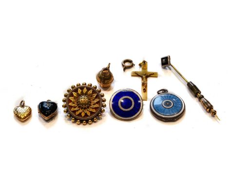 Two enamel target brooches/pendants; a Victorian flower brooch, 3.1cm diameter; a cross pendant, length 4.2cm; two heart shap