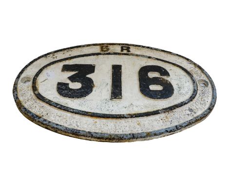 A railway plaque and carriage lamp