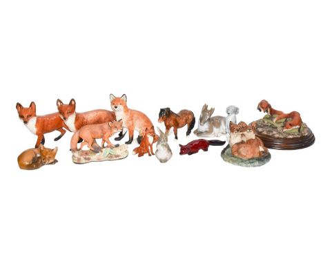 A quantity of ceramic animal models, including: a Royal Doulton flambe fox, Royal Copenhagen fawn and a rabbit, three Beswick