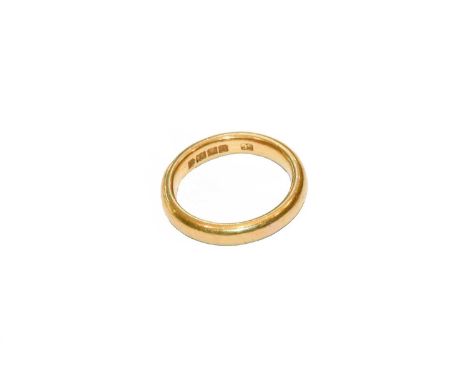 A 22 carat gold band ring, finger size KCondition report: Gross weight 6.5 grams.