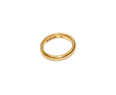 A 22 carat gold band ring, finger size KCondition report: Gross weight 6.5 grams.