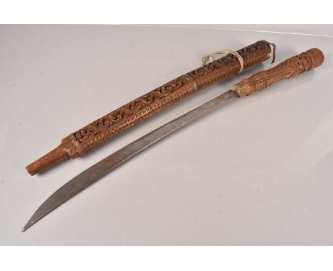 A possibly Vietnamese Dha, having hand carved wooden grip, with 55cm long single edged blade, the blade with small etched wav