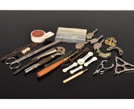 An assortment of vintage Dental Tools and items, to include early Articulating Paper, a Ney's Gold Shell Gauge, four Portex M