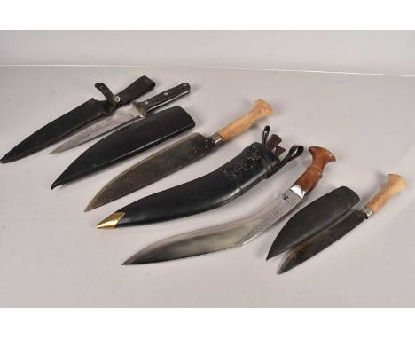 A Middle Eastern Style Kukri knife, complete with scabbard and two skinning knives, together with three other knives (4), no 