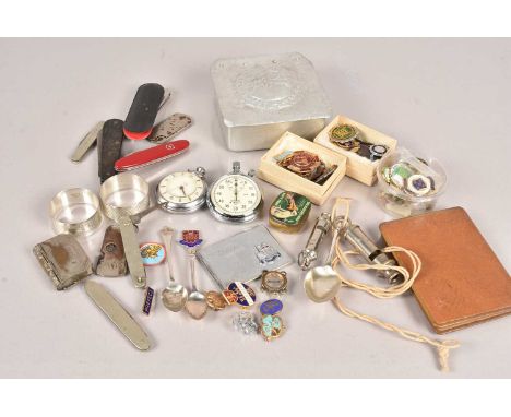 An assortment of various items, to include a pair of silver napkin rings by Joshua Horton & Son, three silver spoons, a Smith