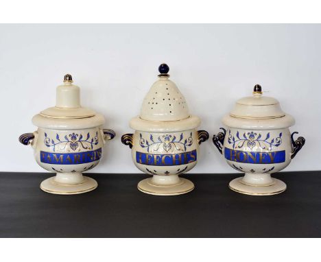 Three Royal Pharmaceutical Society ceramic Pharmacists Apothecary Jars and Covers, comprising Tamarinds, Leeches, and Honey, 