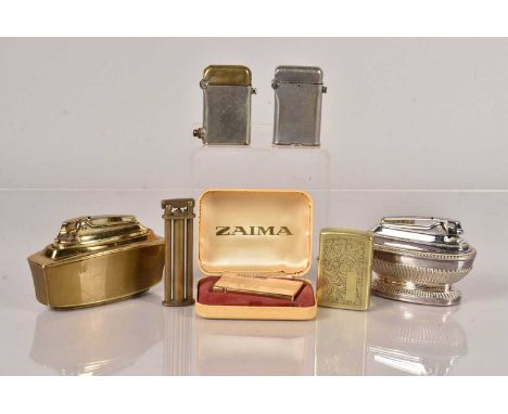 A small selection of Pocket Lighters, to include two Thorens, a Zaima, a 1989 Zippo, a Bronica, plus two Ronson table lighter