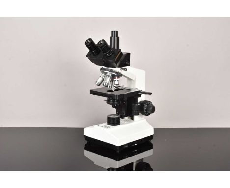 A Celestron Labs CB2000C Binocular Compound Microscope, having 10x and 20x eyepieces, with rotating objective lenses (4x, 10x