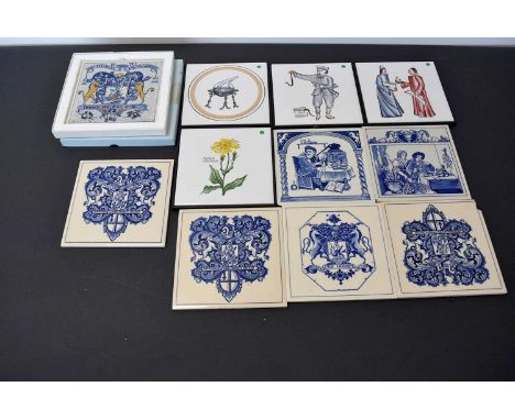 Seven modern Delft ceramic tiles, together with four other modern tiles, depicting various medical items (parcel)