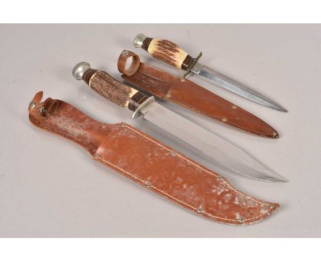 An Original Bowie Hunting knife, the blade marked C.K 9228, having 8'' blade, with antler handle, together with a smaller, pr