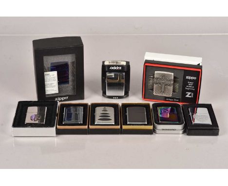 A collection of various Zippo Lighters, to include Celtic Cross Antique Silver MultiCut Engraving, Cool Blue, Spectrum, Back 
