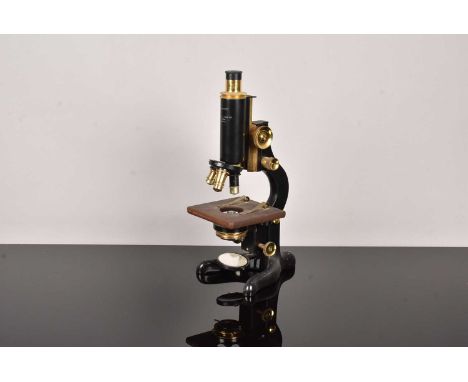 A 20th Century W.Watson & Sons Ltd 'Service' Monocular Microscope, serial number 66470, with rack and pinion focusing, x6 eye