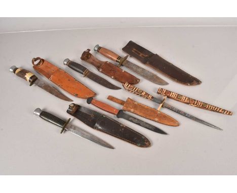 A small collection of Hunting knives, to include one by Whitby, a Pro-Thro Knife, a Venture with Fairbairn Sykes style blade 