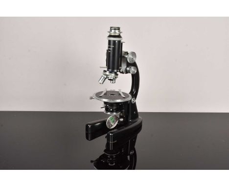 A J Swift & Son Monocular Microscope, serial 31817, having three rotating nose piece, missing one objective, with rotating st