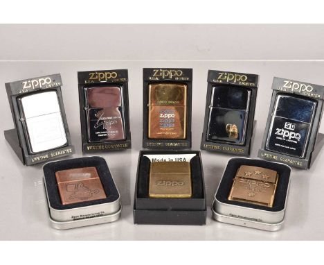 A collection of Zippo Lighters, all with the Zippo logo, including Fan Club Japan, Wind-Proof, 4 Star, and more, all with ret