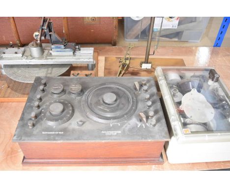 A Wheel and Pinion Cutting machine, together with an incomplete set of Scientific Scales by George & Becker Ltd, a collection