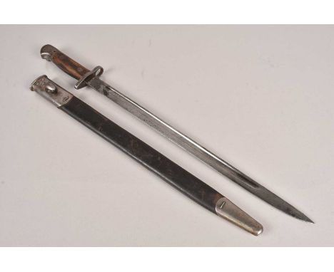 A British 1907 Pattern Bayonet by Wilkinson, dated 15, with multiple proof marks, complete with steel and leather scabbard, n