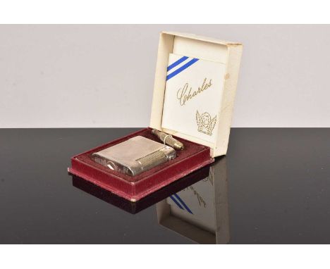 The Charles Lighter, a silver plated pocket lighter, marked 'The Charles Lighter' to the base, patent no.626585, also marked 