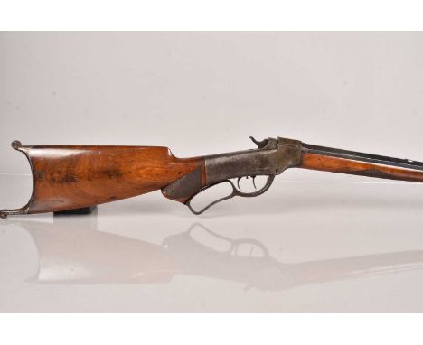 An Obselete Calibre Marlin Firearms Lever Action Rifle, .32-40 calibre, serial 31688, having octagonal and circular barrel, w