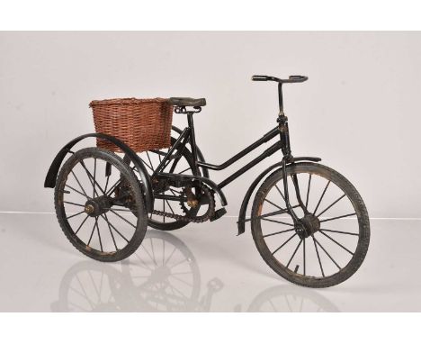 A hand-built model of a Vintage Tricycle, having working chain mechanism,  having rubber tyres and saddle, with small wicker 