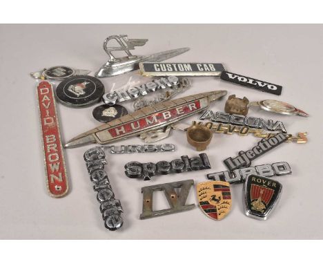 A collection of Motoring badges, to include David Brown, Humber, Porsche, Volvo, Rover, Suzuki and more (parcel)