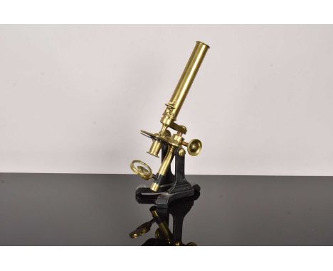 A Victorian brass Monocular Field Microscope, circa 1870, No.309, with rack focus and milled nut fine focus, square stage, co