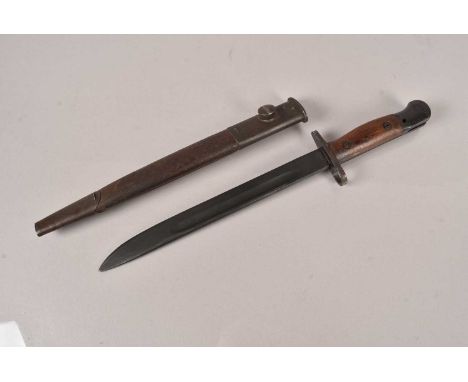 A WWII Australian Own Bayonet, dated 1945, having SLAZ44 stamped to the wooden grip, complete with scabbard, no postage for t